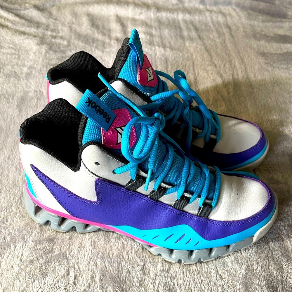 Reebok women’s vintage John wall sneakers.